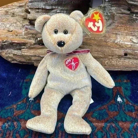 Ty 1999 signature bear. Still has tags on it and protective covering. Perfect - Picture 1 of 7